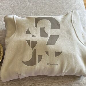 Lululemon Beige Hoodie with Graphic Design